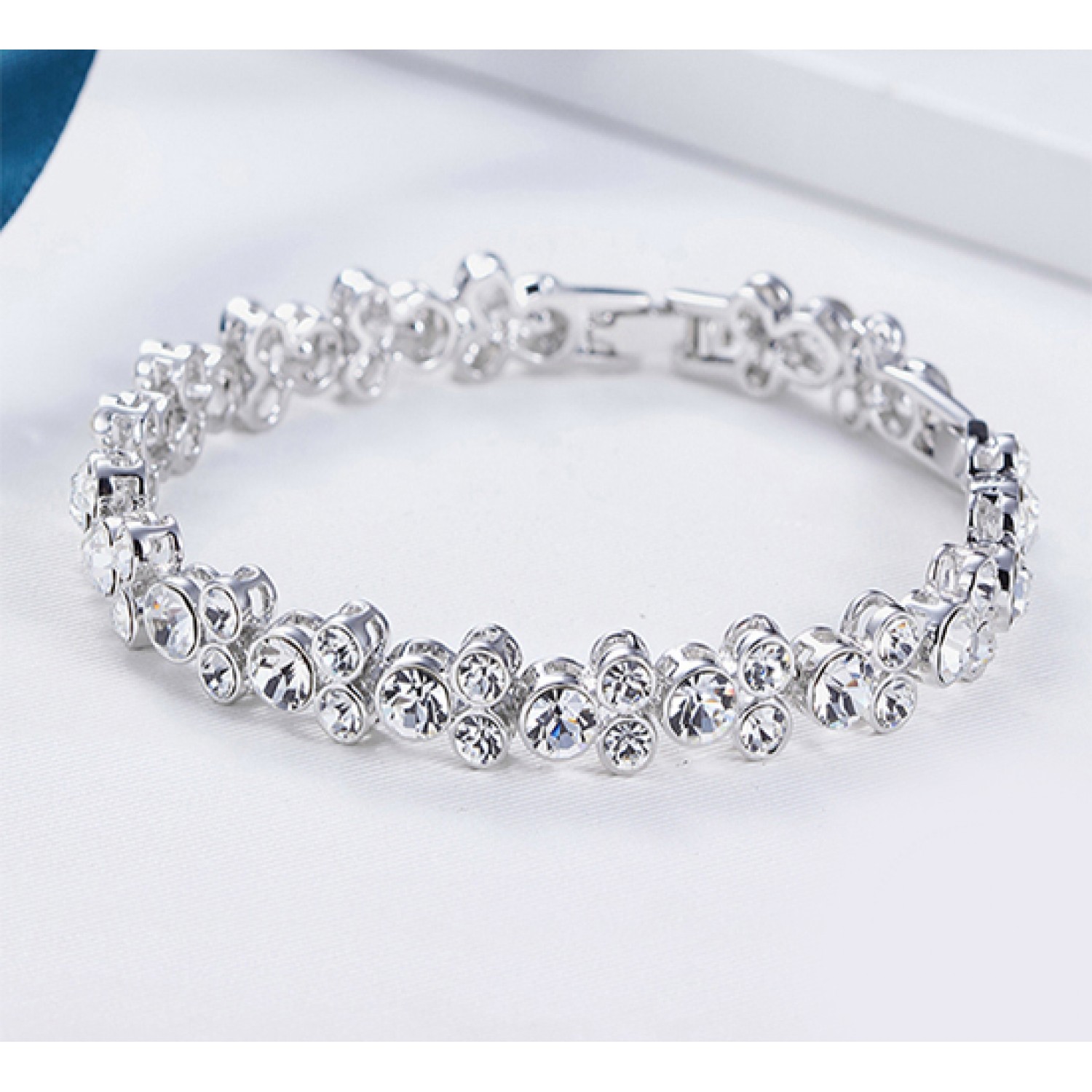 Amazon.com: Swarovski Twist Rows Women's Bangle Bracelet with Clear  Swarovski Crystals on a Rhodium Plated Setting, Size L: Clothing, Shoes &  Jewelry